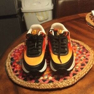 Fila Women's Black and Orange Sneakers. Size 6.5 ,But Will Fit A Woman's 7.5